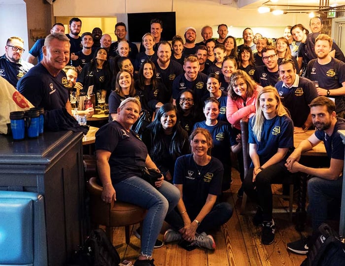 A team of volunteers with the Only A Pavement Away 